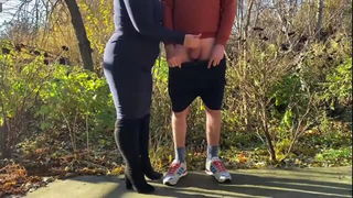Still from Stepmom outdoor handjob cumshot, older woman sex video
